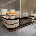 Storage Coffee Table with Quilted Leather Panels and High-Gloss Wood Veneer